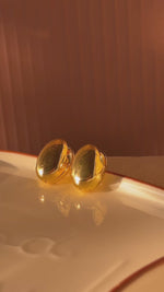 Load and play video in Gallery viewer, Golden pebble drops Earrings
